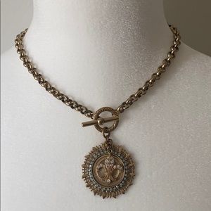 Fleur de lis necklace